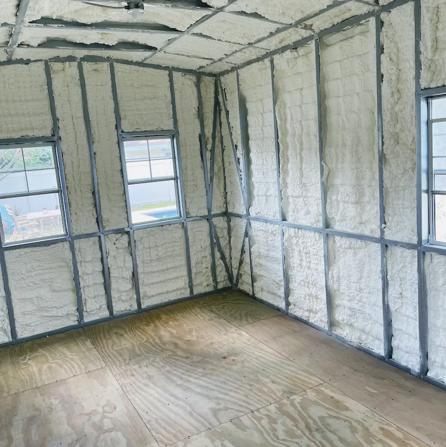 Closed-cell spray foam insulation applied to wall cavities in a residential project in Gun Barrel City